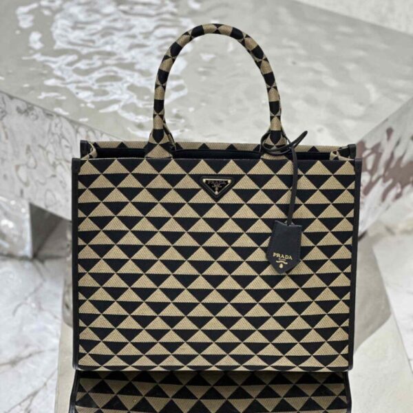 desc_prada-large-prada-symbole-embroidered-fabric-handbag_0