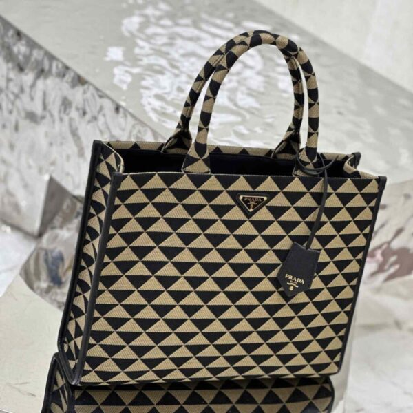 desc_prada-large-prada-symbole-embroidered-fabric-handbag_5